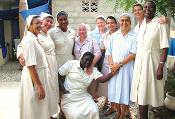 The Daughters of Charity minister in Cit&eacute; Soleil, a desperately poor neighborhood in a large slum near Port-au-Prince. Here the sisters who work there regularly stand with five sisters of the Daughters of Charity, who came from other regions to help after the earthquake.