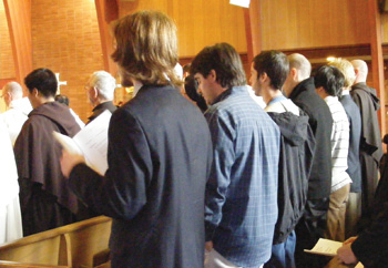 Discernment  retreat participants pray with the Carmelite Fathers of Middletown, N.Y.