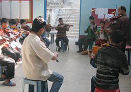 A music lesson at Gandhi Ashram School in Kalimpong, India