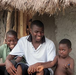Brother Fabian Jongwe, SC plays with children during a break (Mozambique)