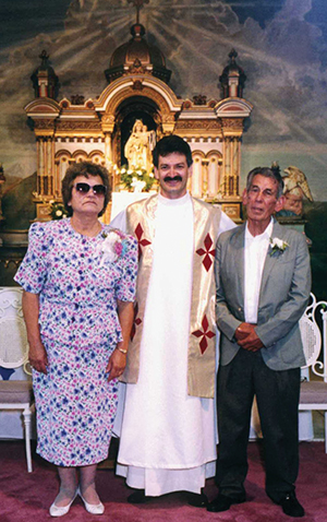 The author with his parents at ordination.