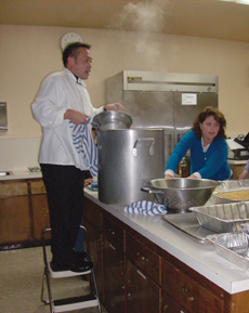 FATHER Patalinghug cooks a big pot of pasta with Peggy Murray, a parish director of religious education, while developing the TV show Grace Before Meals.