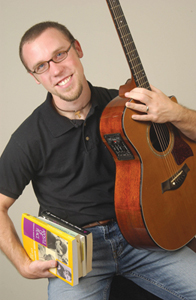 Patrick Gilger, S.J. with guitar