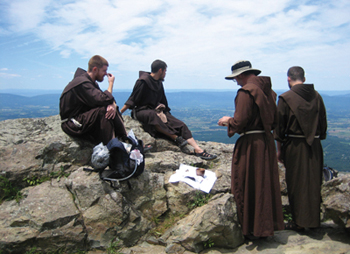 The friars prepare to celebrate the Eucharist along the Appalachian Trail.