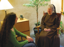 Sister Mary Elizabeth Endee, F.S.E. speaks with a young woman at the Franciscan Life Center, Meriden, Connecticut.