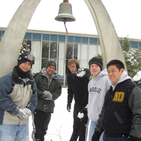 Matthew Kuczora, C.S.C. (far left) with friends outside Moreau Seminary in Notre Dame, Indiana.