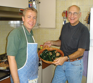 In Mexico Brother Brian Halderman, S.M. helps prepare stuffed peppers with Brother Ed Longbottom, S.M. for the community in Puebla.