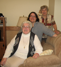 MIXING IT UP: Sister Susan Francois, C.S.J.P. (at right, center) loves living with “ready-made experts,” including Sisters Alicia Cavanaugh, C.S.J.P. (front) and Eleanor Maragliano, C.S.J.P.