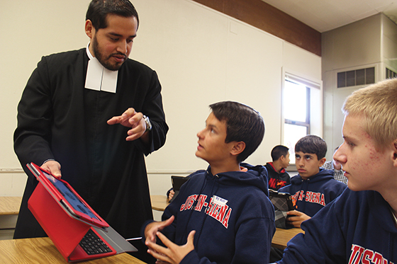 Once a week Brother Roberto Martinez, 27 (left), and the other novices help out in classes at the local Lasallian high school. “My role as a brother in today’s day and age,” says Brother Dave Deradoorian, “is to simply and humbly walk with young people throughout their journey of faith.” 