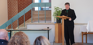 kidd speaks during a function at the university Chaplaincy Center, where she serves.