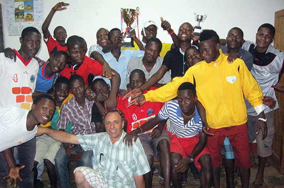 The celebrations (below) following a second-place soccer trophy lasted for days. Brother Angel Monge, S.C., bottom center, is both a teacher and soccer coach.