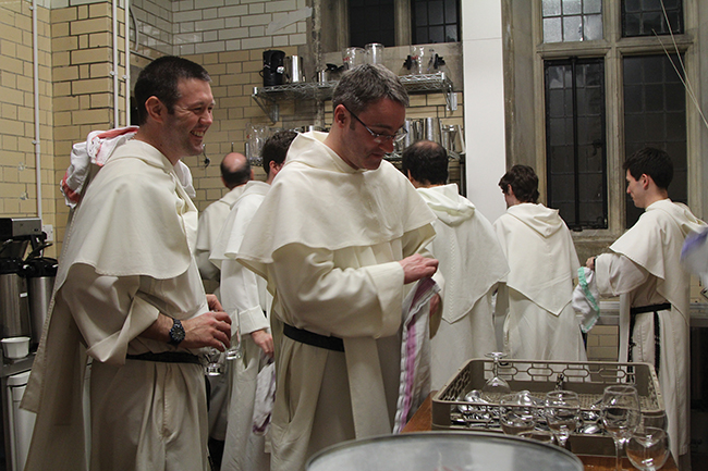 Washing dishes after dinner is a communal activity—all part of the life of this community of Dominicans.