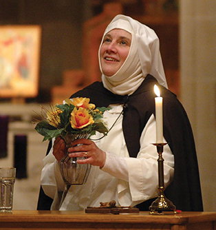 Sister Nancy Murray, O.P, putting on a one-woman show about Saint Catherine of Siena.