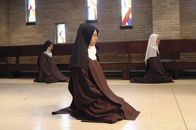 Carmelite nun praying