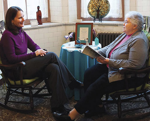 Sister Michelle Lesher, S.S.J. (left) talks with Sister Roberta Archibald, S.S.J.