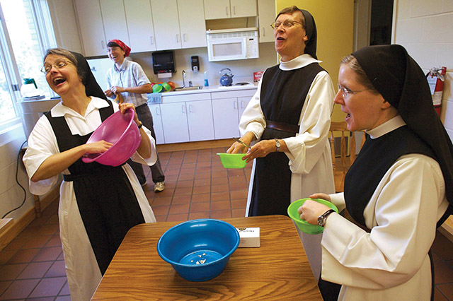 The sisters take a popcorn break to celebrate the birthday of Sister Ciaran Shields, O.C.S.O. (far right). Joining in the fun are Sisters Kathleen O’Neill, O.C.S.O., Myra Hill, O.C.S.O., and Carol Dvorak, O.C.S.O.