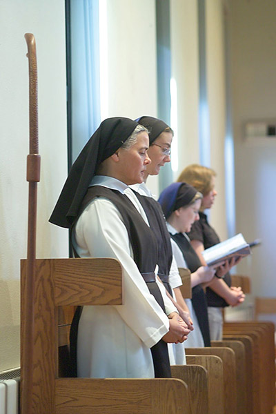 Before the sun rises, the nuns gather to pray Vigils. 
