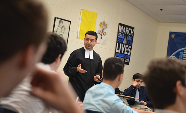 Brother Arturo Martínez Del Castillo, F.S.C. gives a classroom presentation. 