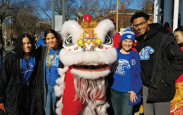 In her ministry as coordinator of international admissions at Albertus Magnus College, Gonzalez joins students in a Lunar New Year celebration. 