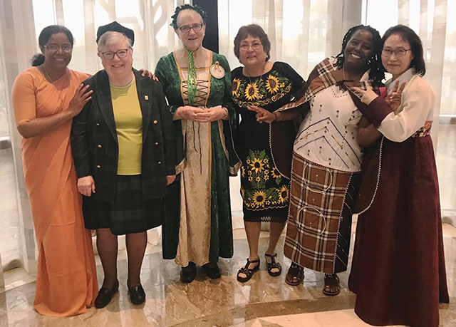 Sisters of St. Joseph of Peace wear traditional clothing reflecting their cultural heritage.