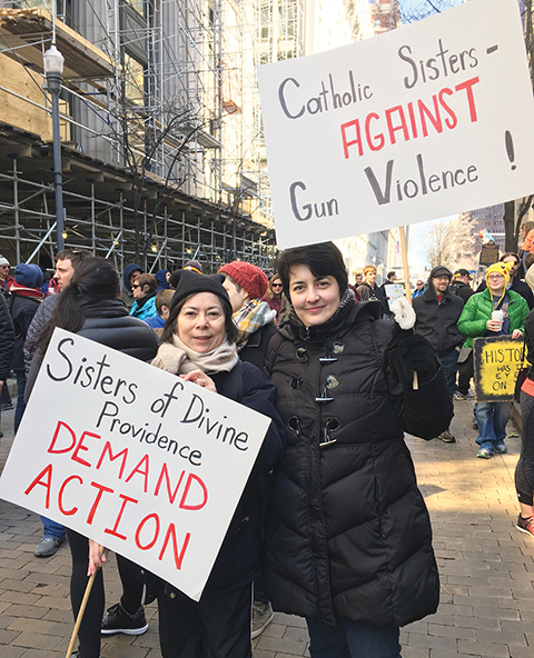 Sisters Karina Conrad and Ana Lydia Sonera, C.D.P. at the March for Our Lives demonstration in Pittsburgh.