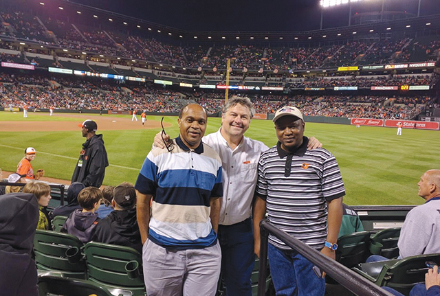 Munishi enjoys sports during his time off. In this photo he is attending a Baltimore Orioles baseball game with friends.