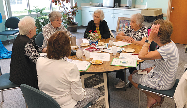 members of the Sisters of Divine Providence at a community assembly.