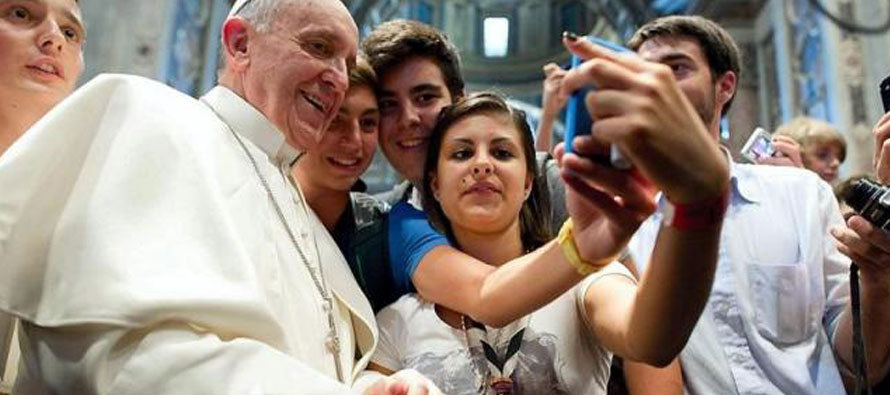 Pope and young adults selfie
