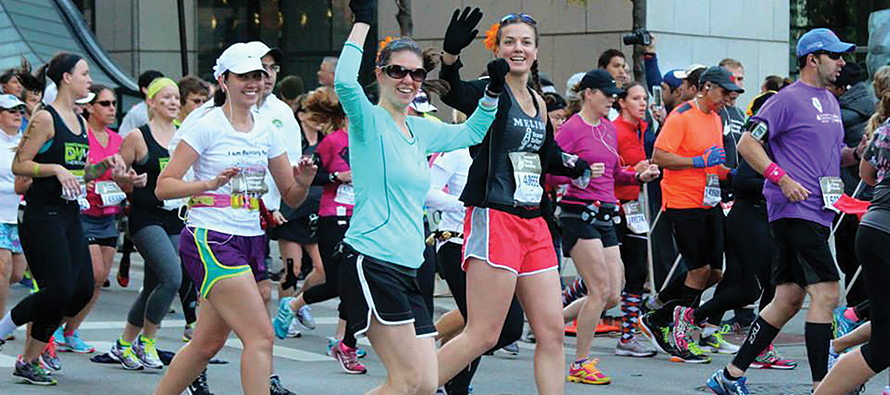 Three women running a race