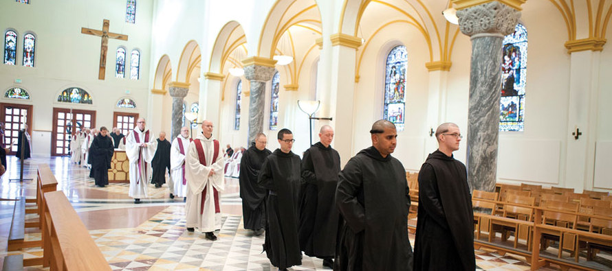The Benedictine community processes into church