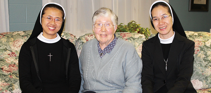 Ursuline Sister Ruth Gehres with Sister Anh Tran, left, and Sister Huyen Vu