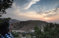 woman gazing at Mount Nebo