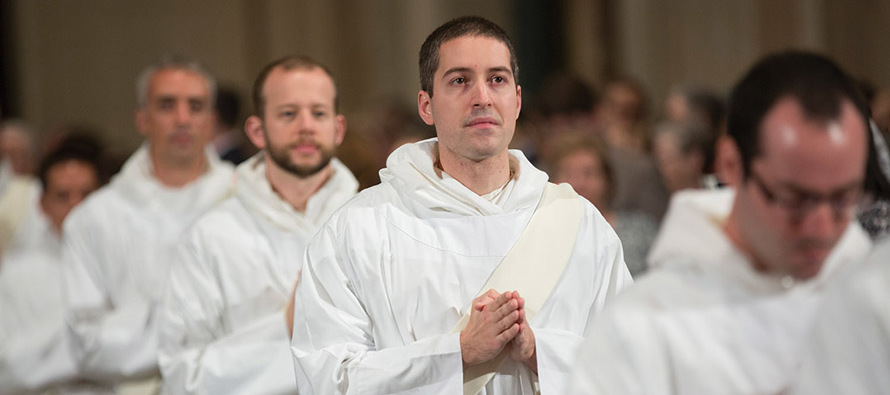 Joseph Anthony Kress files into his ordination Mass along with several other men who are about to become Dominican priests.