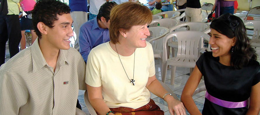 Sister Terry Rickard, O.P. meets with young people during a RENEW International visit to El Salvador.