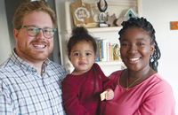Evan and Elyssa Bradfield with their daughter, Josie.