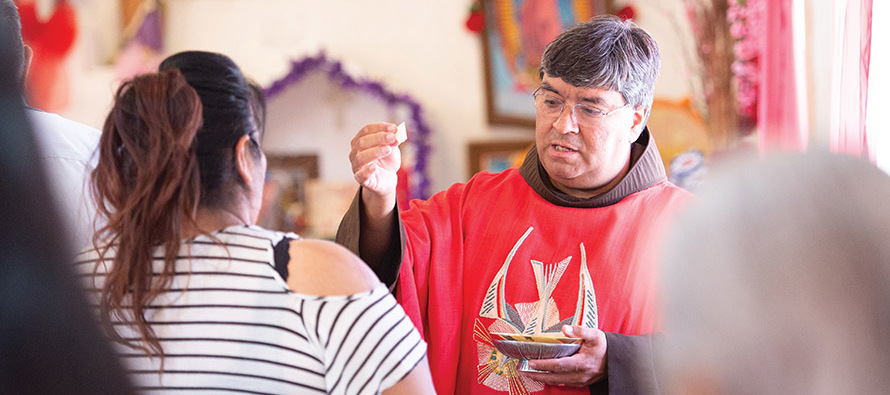 Father Ponchie Vásquez, O.F.M. celebrates a Mass at one of the 40 village chapels located within the reservation of the Tohono O’odham.