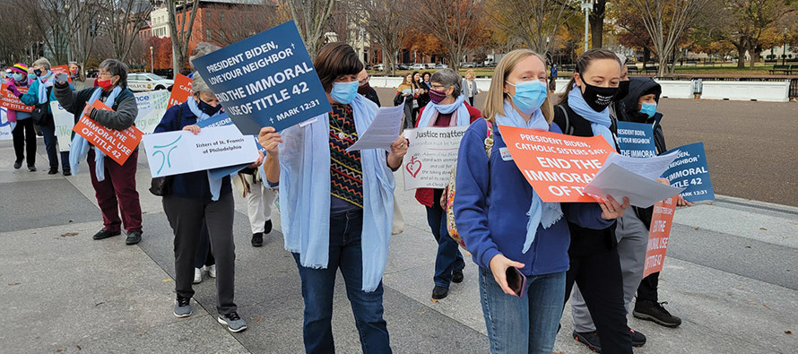 Sister Tracy Kemme, S.C. walks with other Catholic sisters in Washington, D.C., at a demonstration supporting immigration reform.