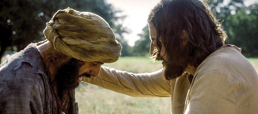 Jesus heals a leper in a scene from The Chosen. 