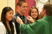 young adults at Catholic Mass